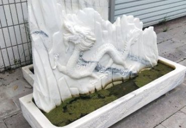 黑龙江某小区大理石假山水池雕塑项目